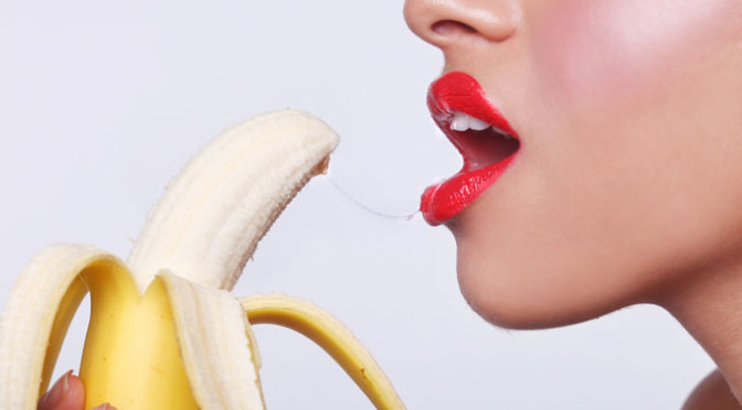 Blowjob Concept: Sensual Woman About to Eat Banana